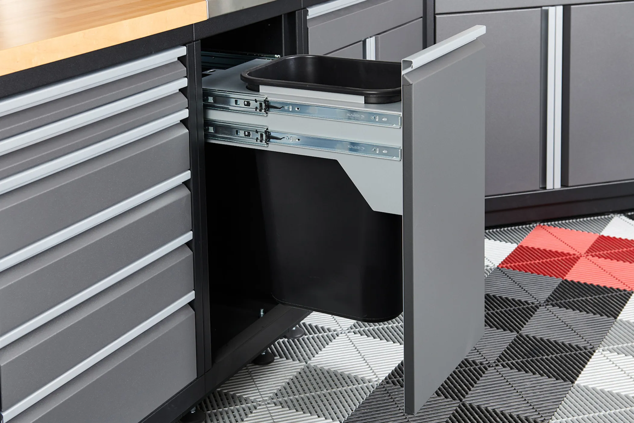 Trash Bin Cabinet Image, showcasing a trash bin cabinet with a sleek, modern design, featuring a combination of drawers and cabinets for efficient storage and organization.